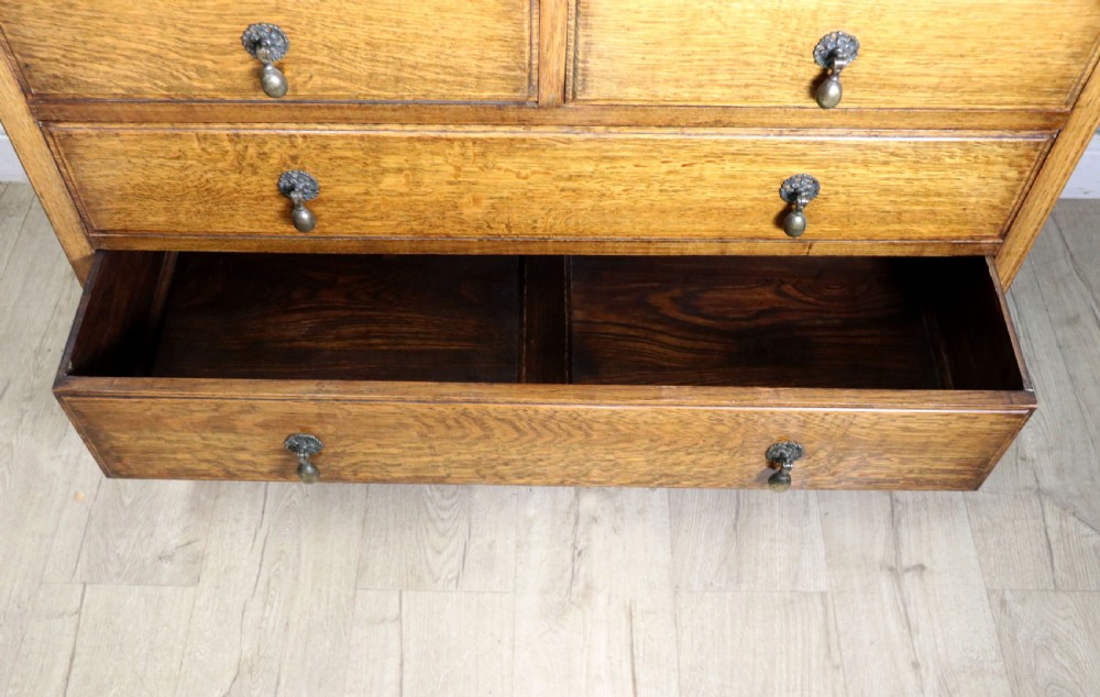 A lovely early 20th century oak dressing chest!. View XIV