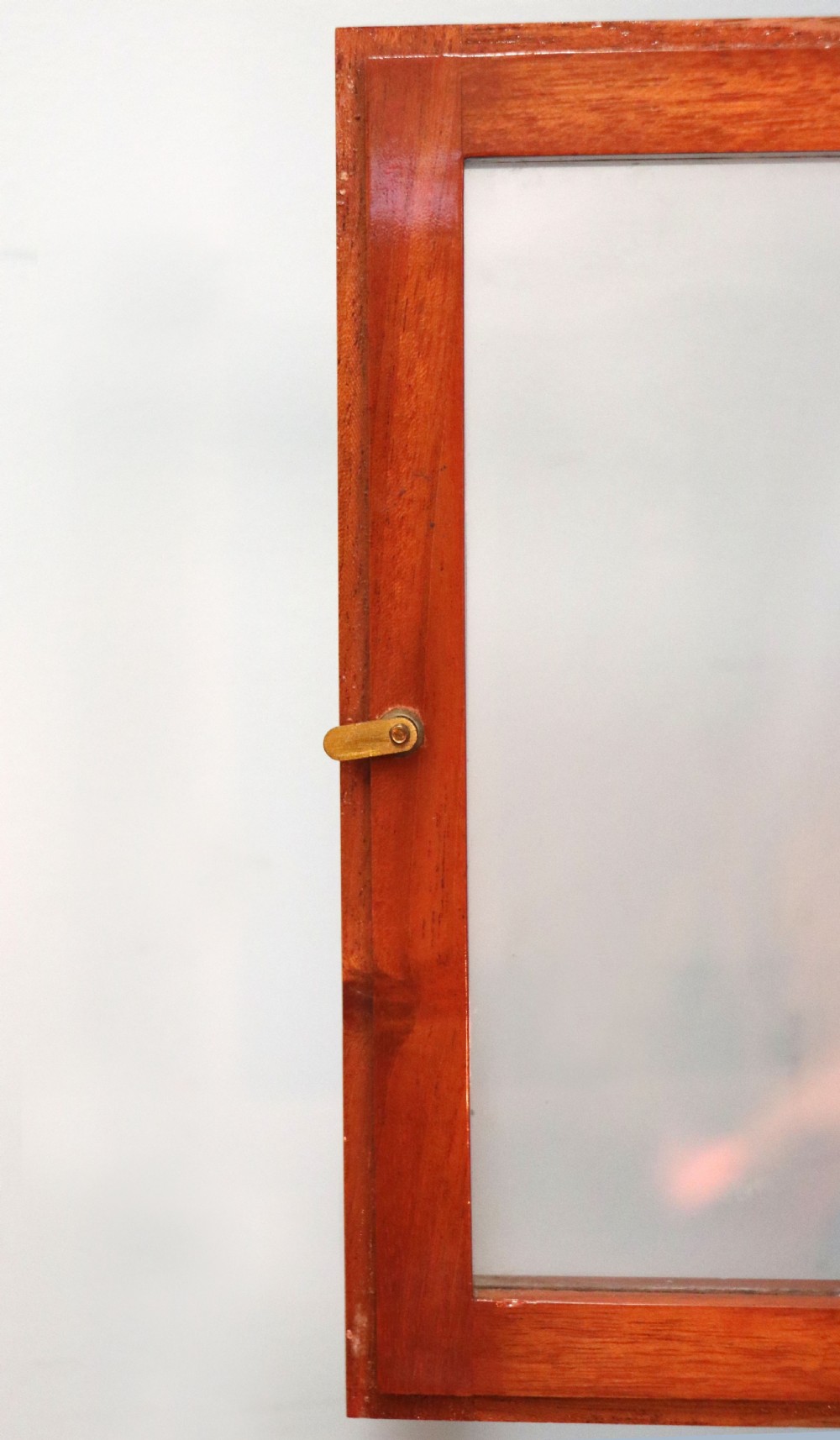 An Oertling precision chemists beam balance scale with a brass mechanism housed inside a glazed timber cabinet featuring gilded gold typography. View XIII