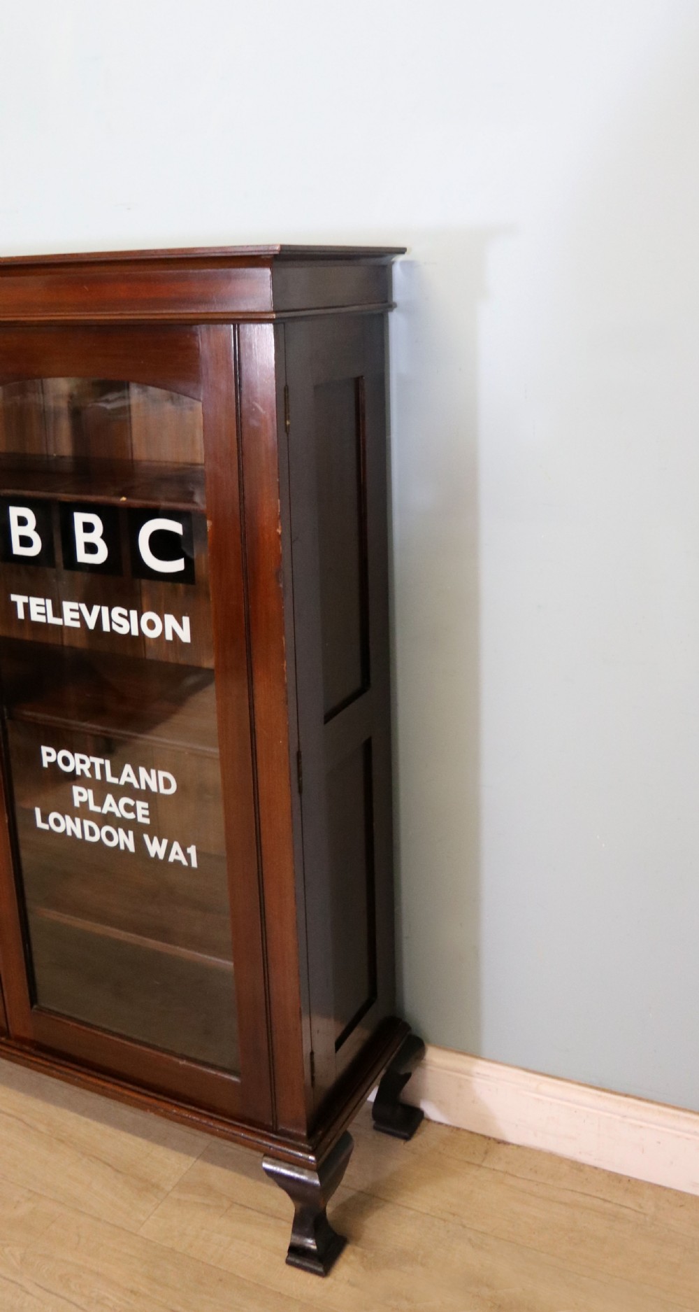  A lovely early 20th century mahogany framed glazed bookcase cabinet, later sign written for the (BBC) View XII