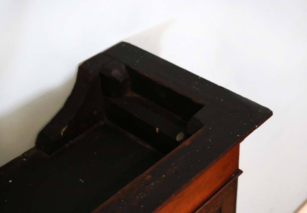 A quality mahogany shop display cabinet, later sign written for A.Levi  watch and clockmakers. View XVI