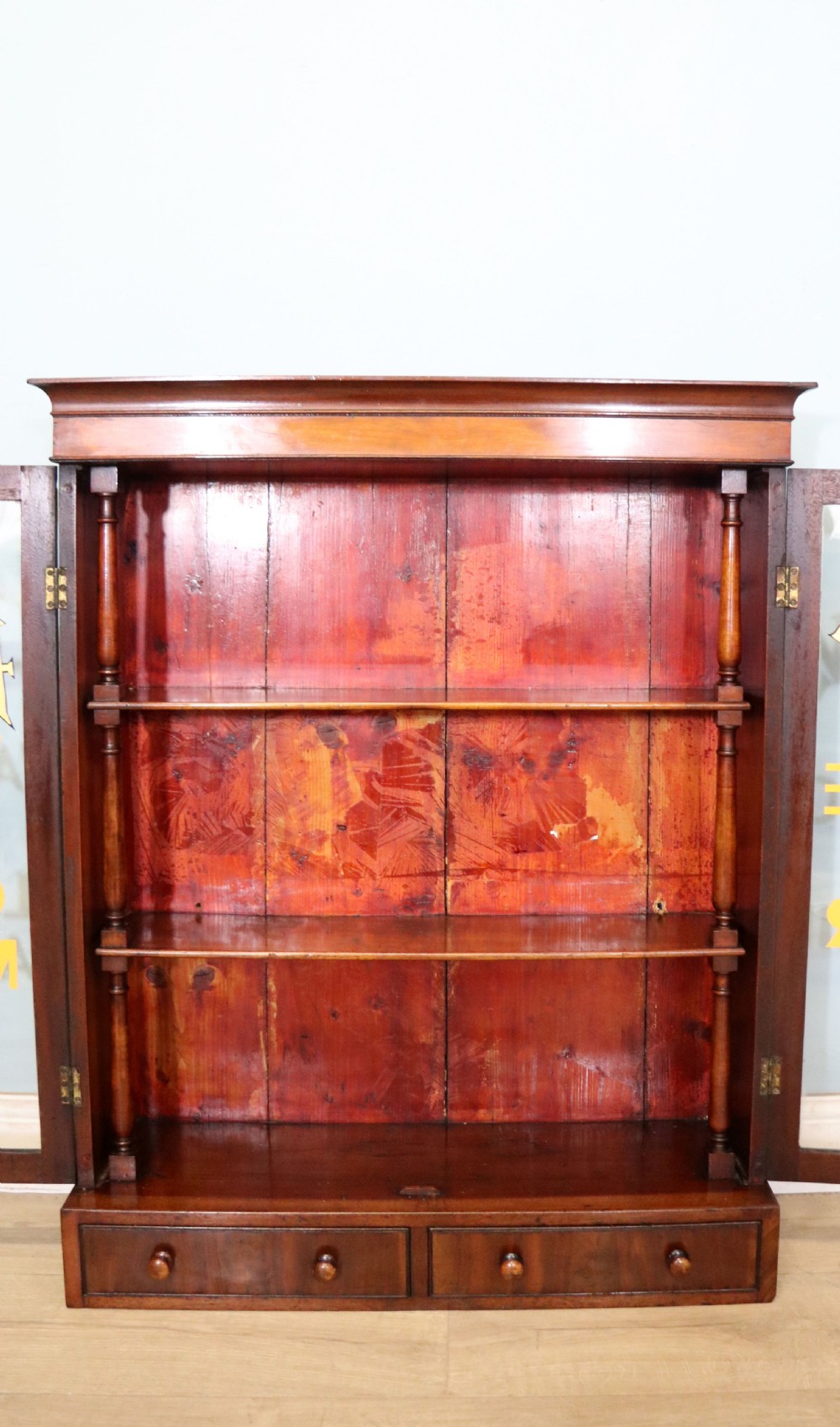A quality mahogany shop display cabinet, later sign written for A.Levi  watch and clockmakers. View XX