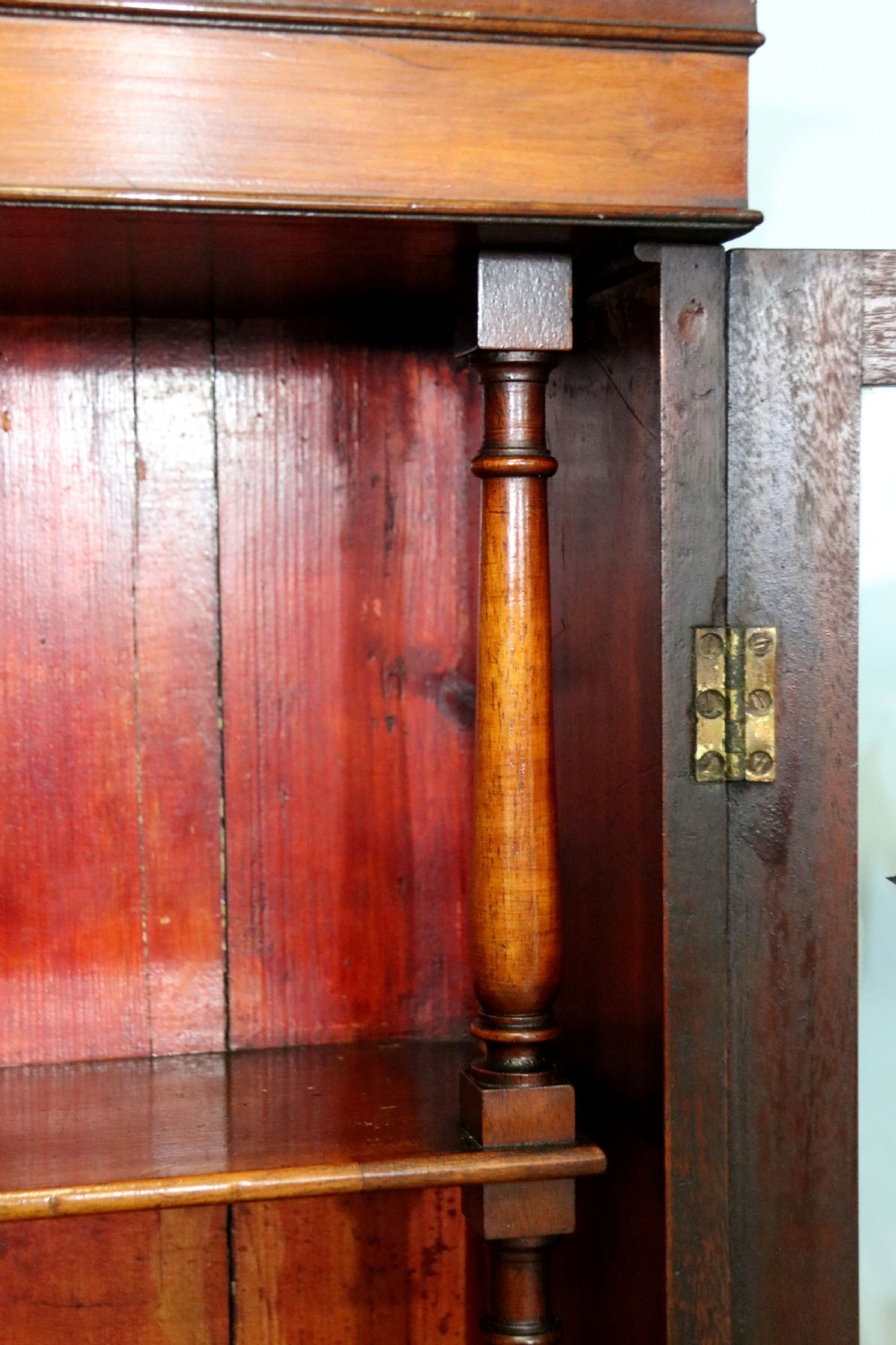 A quality mahogany shop display cabinet, later sign written for A.Levi  watch and clockmakers. View XXV