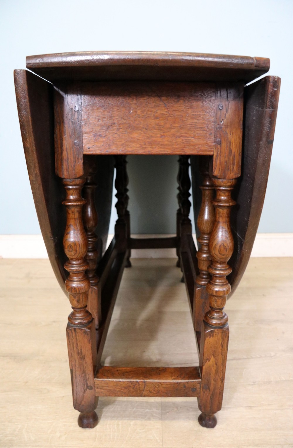  A beautiful 17th century style oval oak gateleg table. View XIII