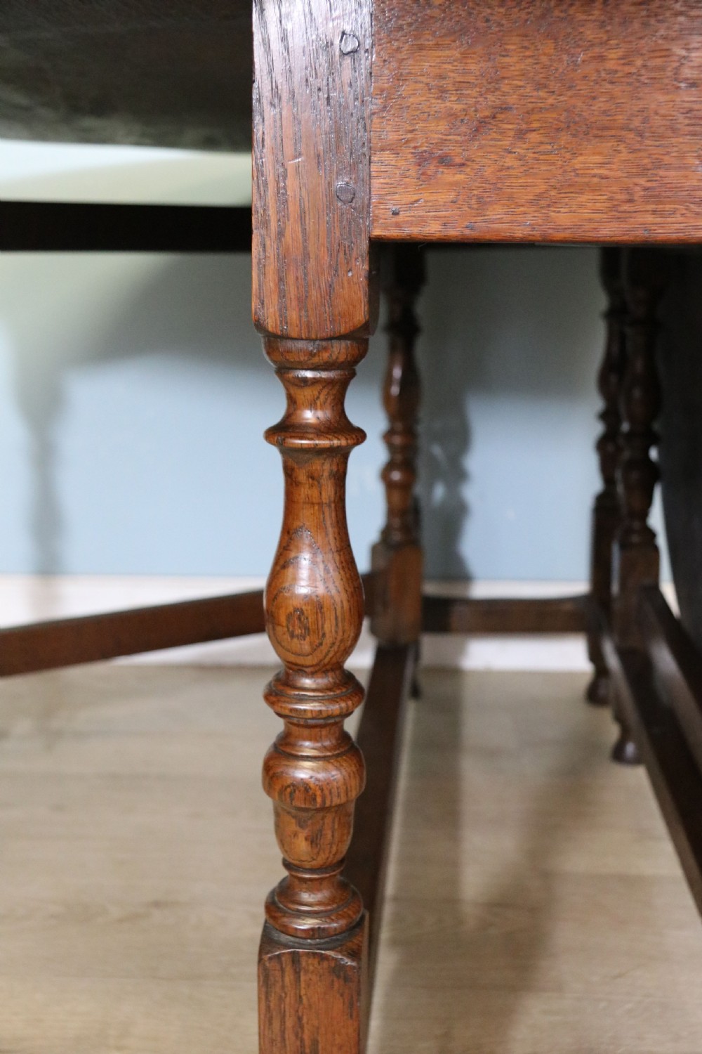  A beautiful 17th century style oval oak gateleg table. View XVII