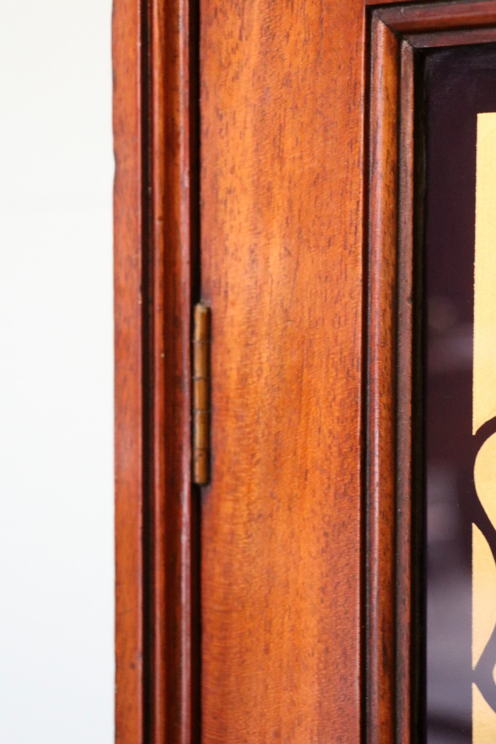 A lovely mahogany framed wall mounted display cabinet hand sign written for Cadburys Chocolate View XV