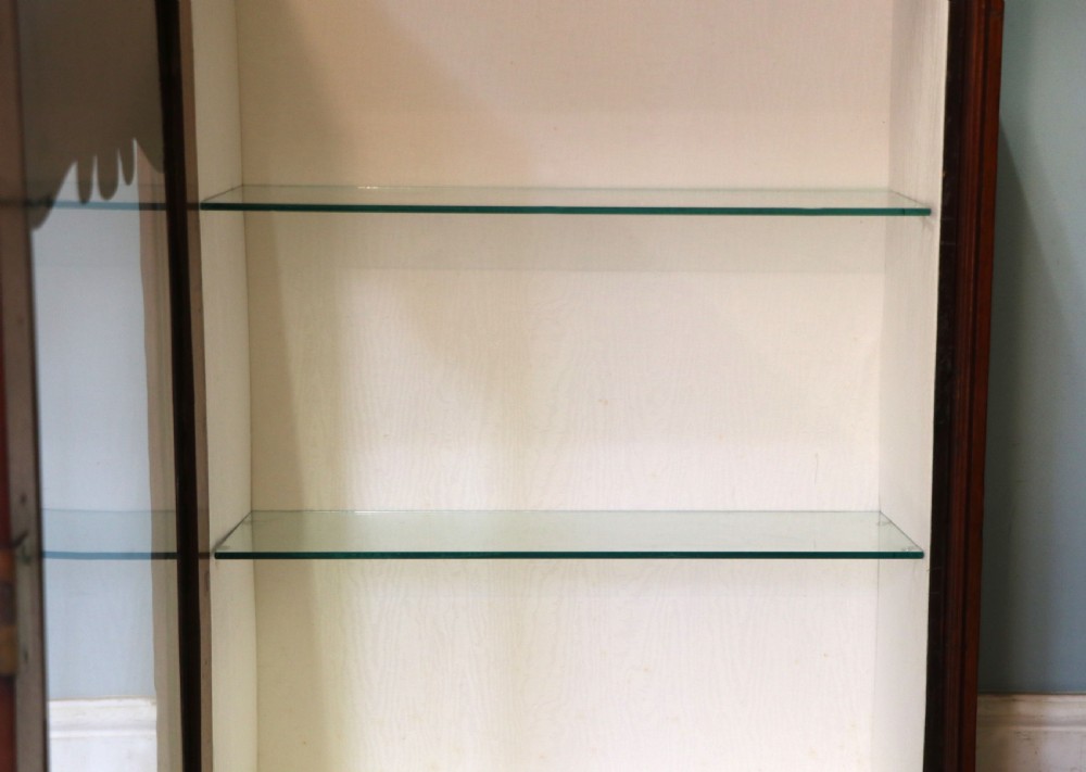 A lovely mahogany framed wall mounted display cabinet hand sign written for Cadburys Chocolate View XVII