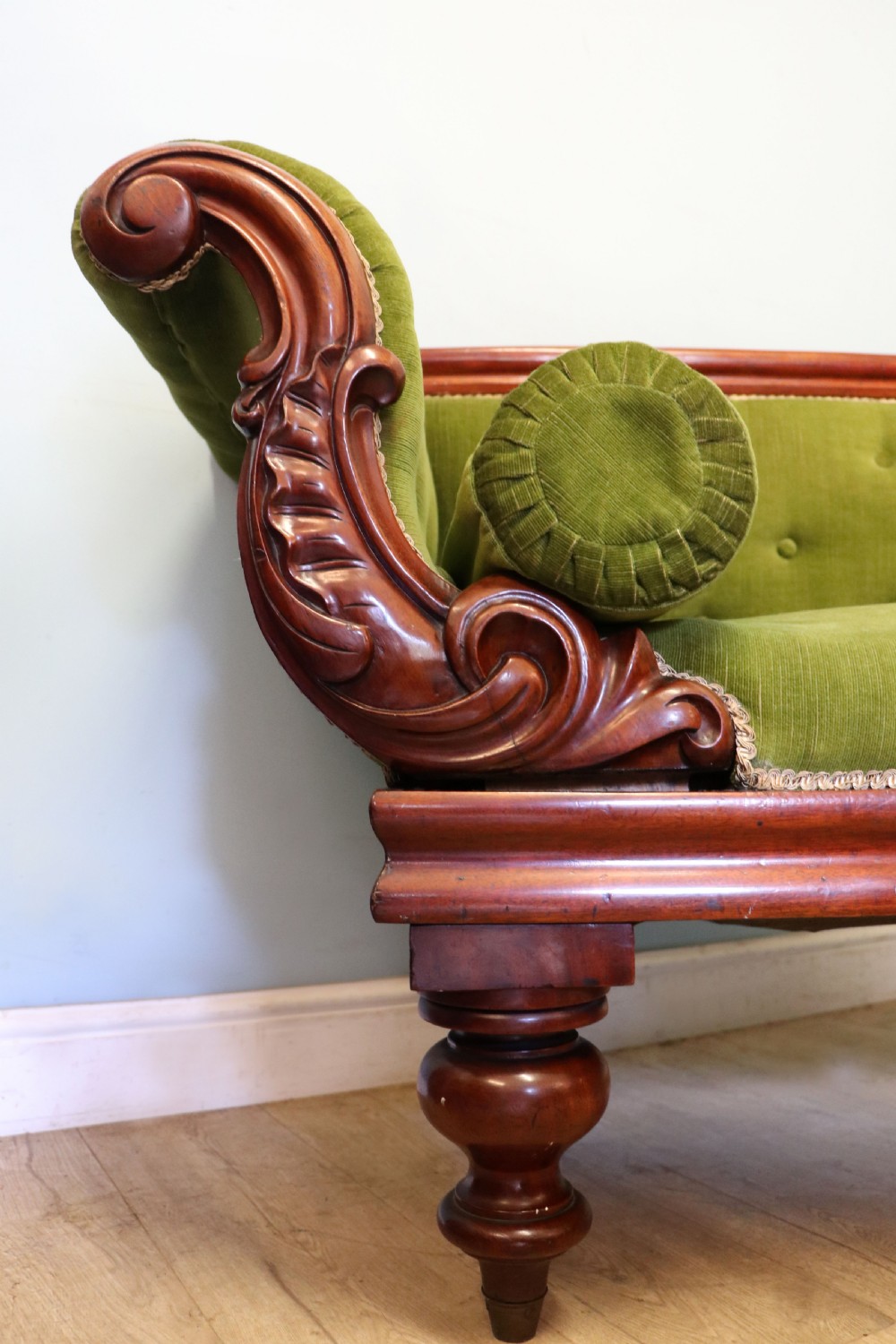 A superb vintage green Victorian sofa. View VIII