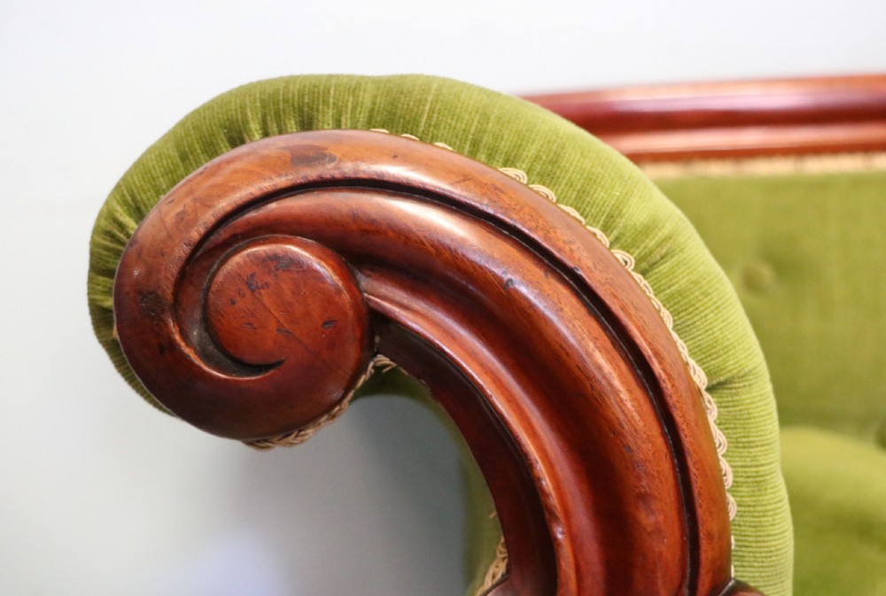 A superb vintage green Victorian sofa. View IX