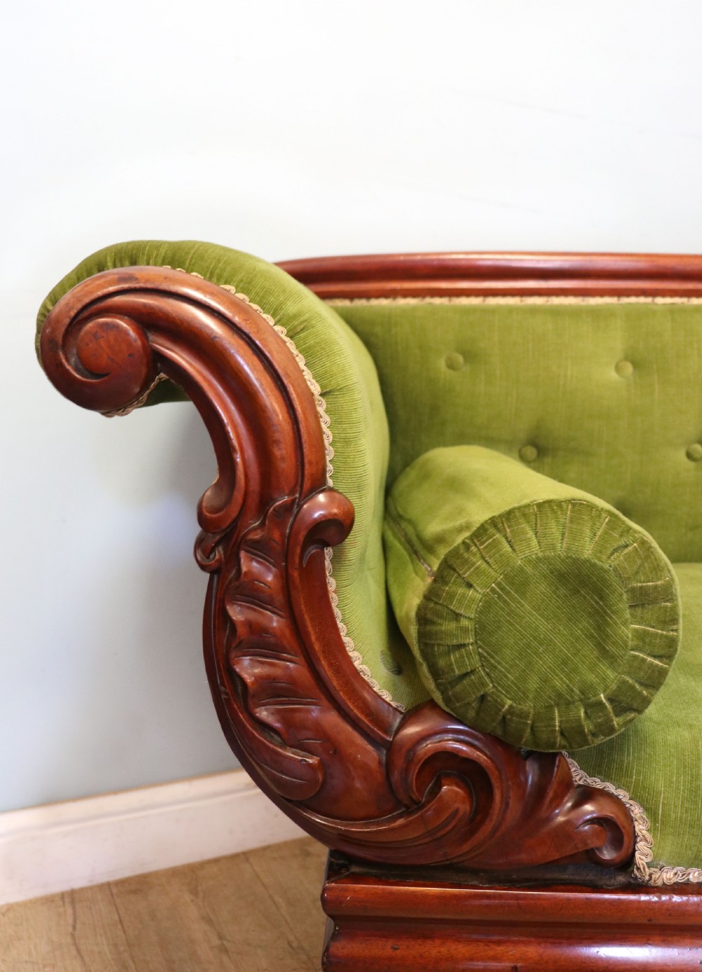 A superb vintage green Victorian sofa. View X
