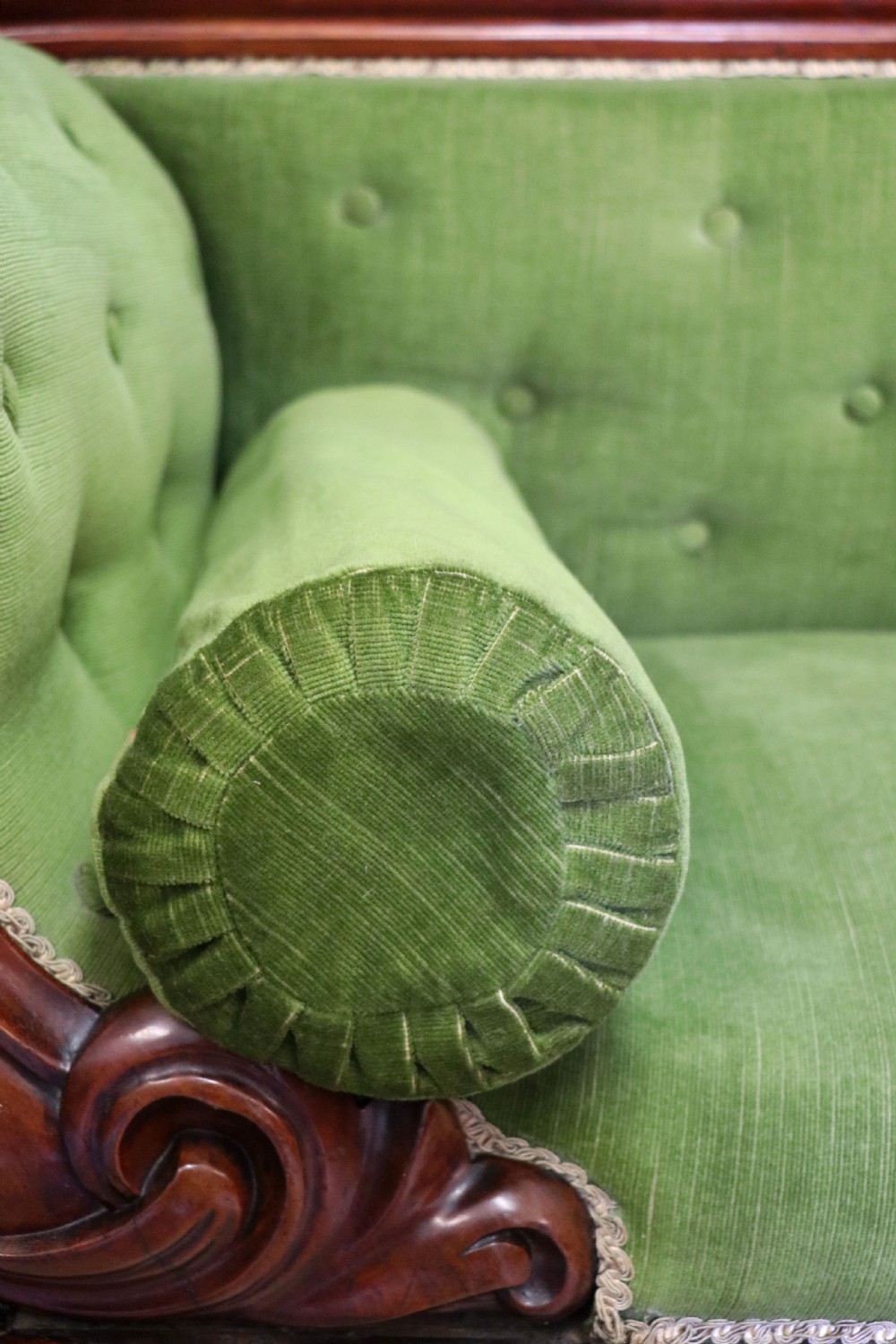 A superb vintage green Victorian sofa. View XII