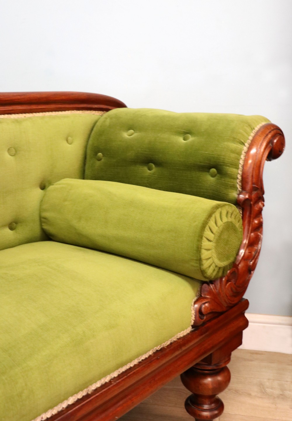 A superb vintage green Victorian sofa. View XIV