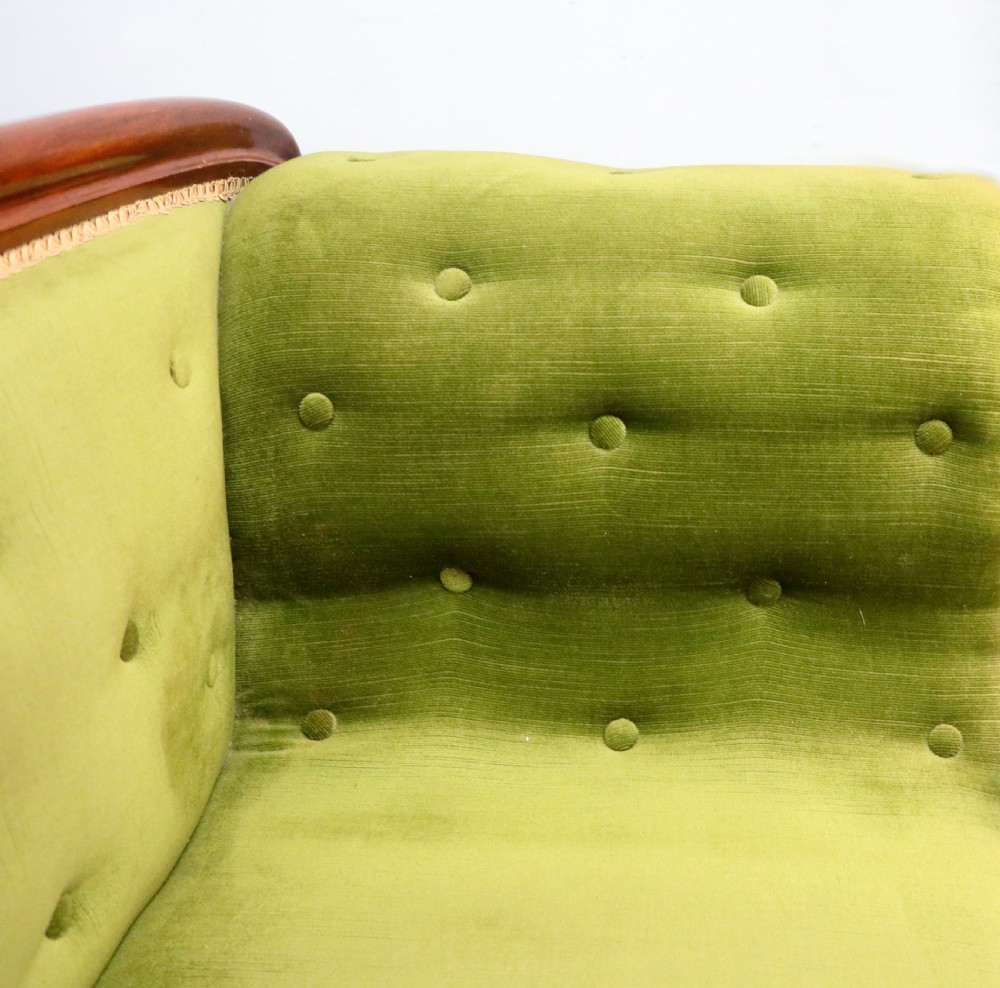 A superb vintage green Victorian sofa. View XVII