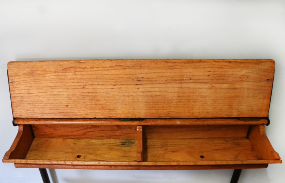 A wonderful early 20th century oak and iron framed school desk and integral chair.  View XI