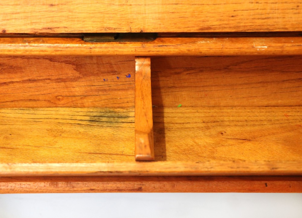 A wonderful early 20th century oak and iron framed school desk and integral chair.  View XIII