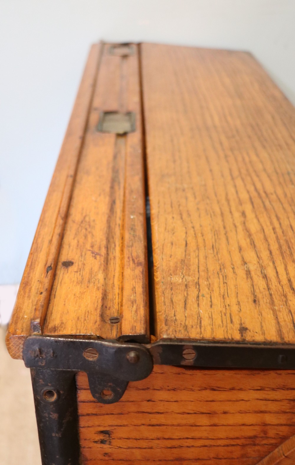 A wonderful early 20th century oak and iron framed school desk and integral chair.  View XVIII