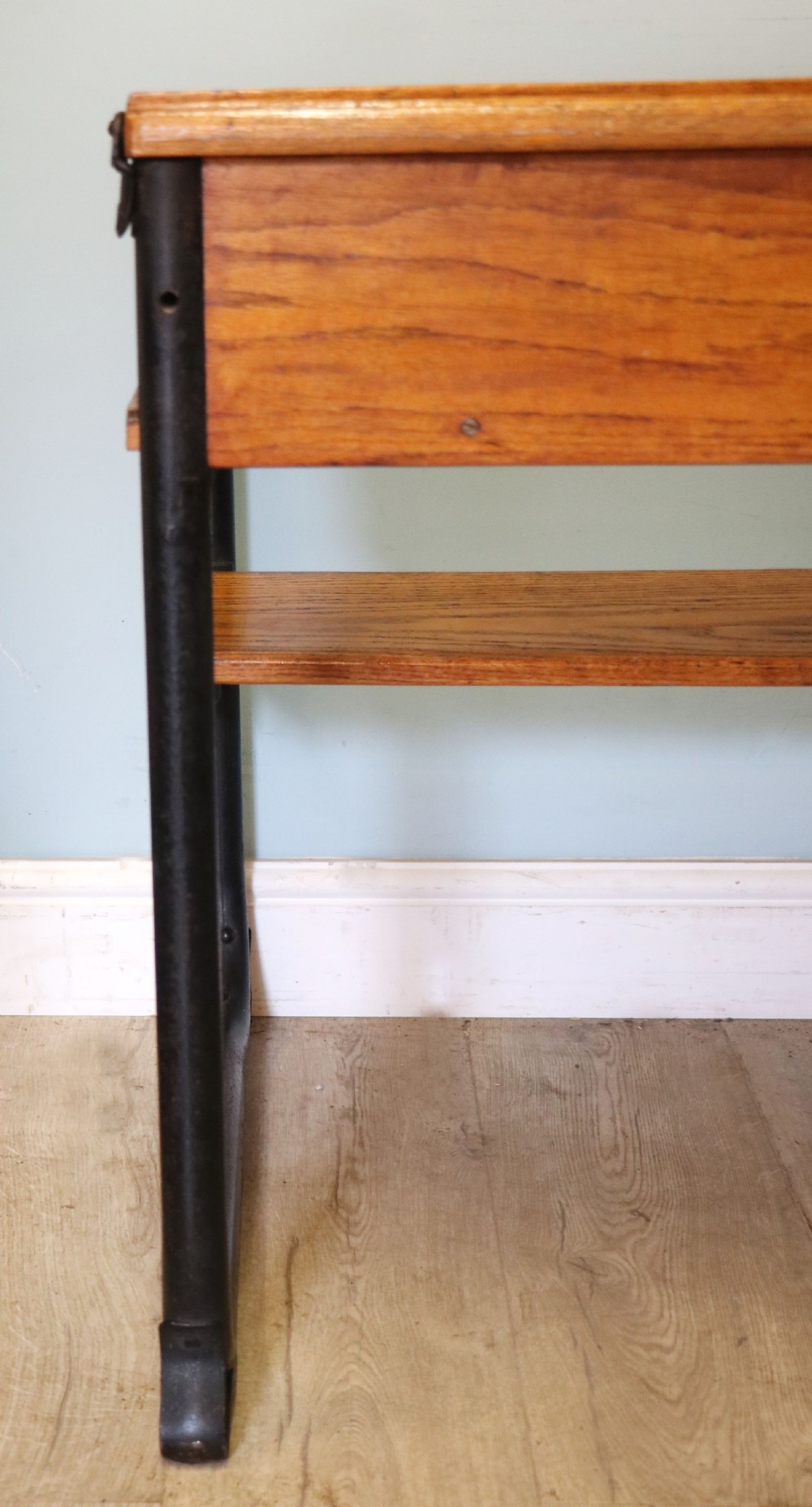 A wonderful early 20th century oak and iron framed school desk and integral chair.  View XXIV