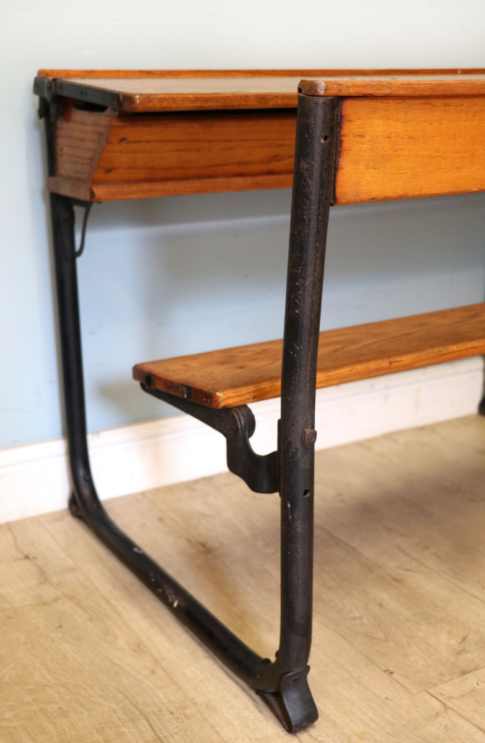 A wonderful early 20th century oak and iron framed school desk and integral chair.  View XXVI