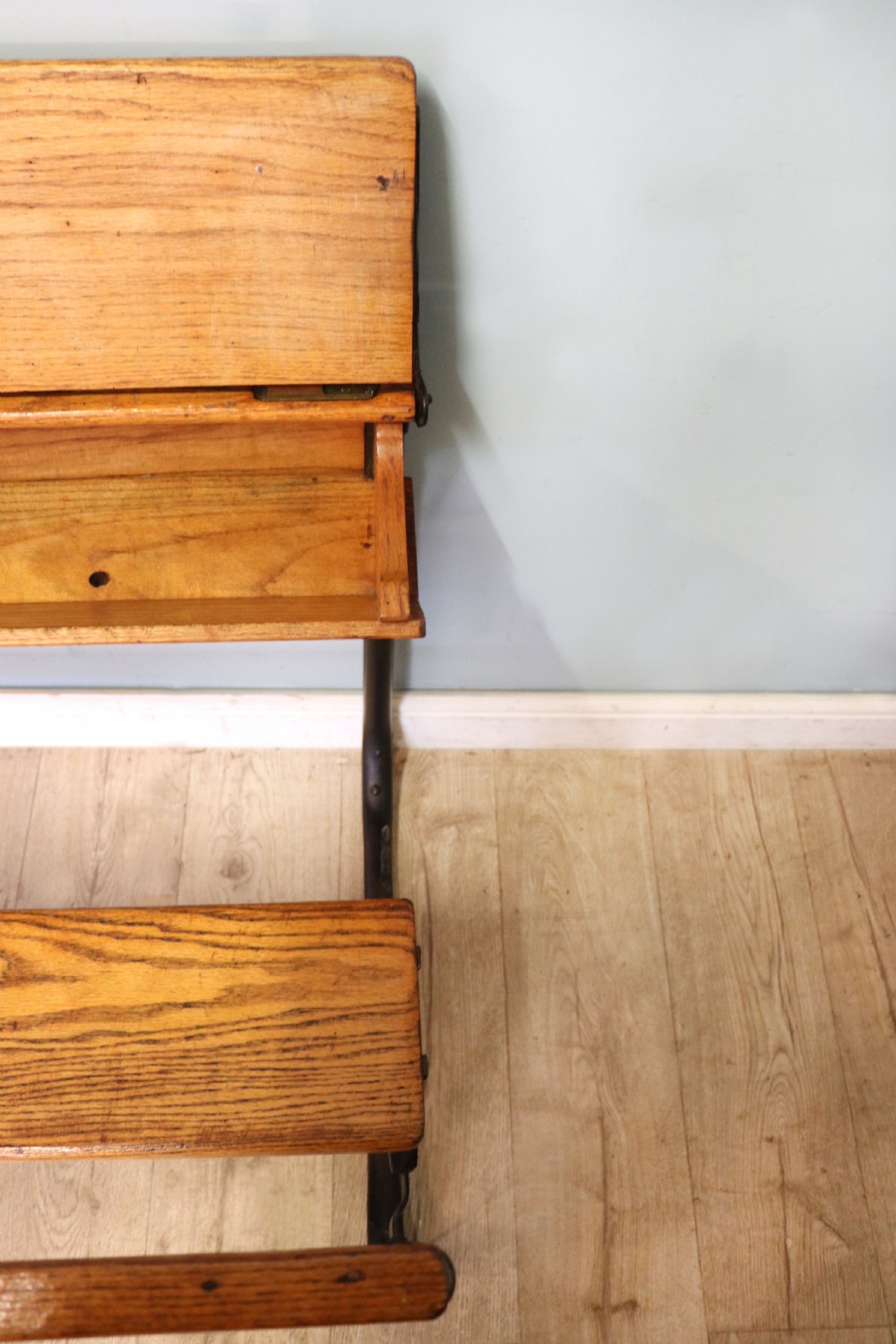 A wonderful early 20th century oak and iron framed school desk and integral chair.  View XXVII