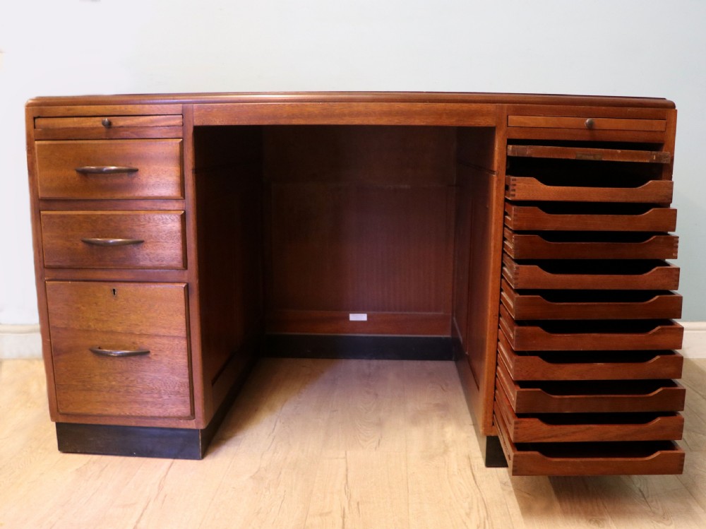 A superb quality stylish 20th century mahogany twin pedestal desk. View V