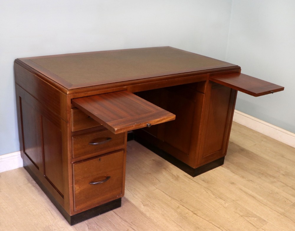 A superb quality stylish 20th century mahogany twin pedestal desk. View XI