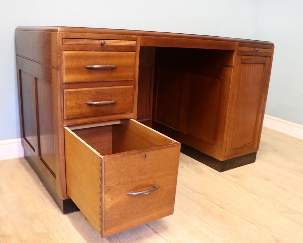 A superb quality stylish 20th century mahogany twin pedestal desk. View XII