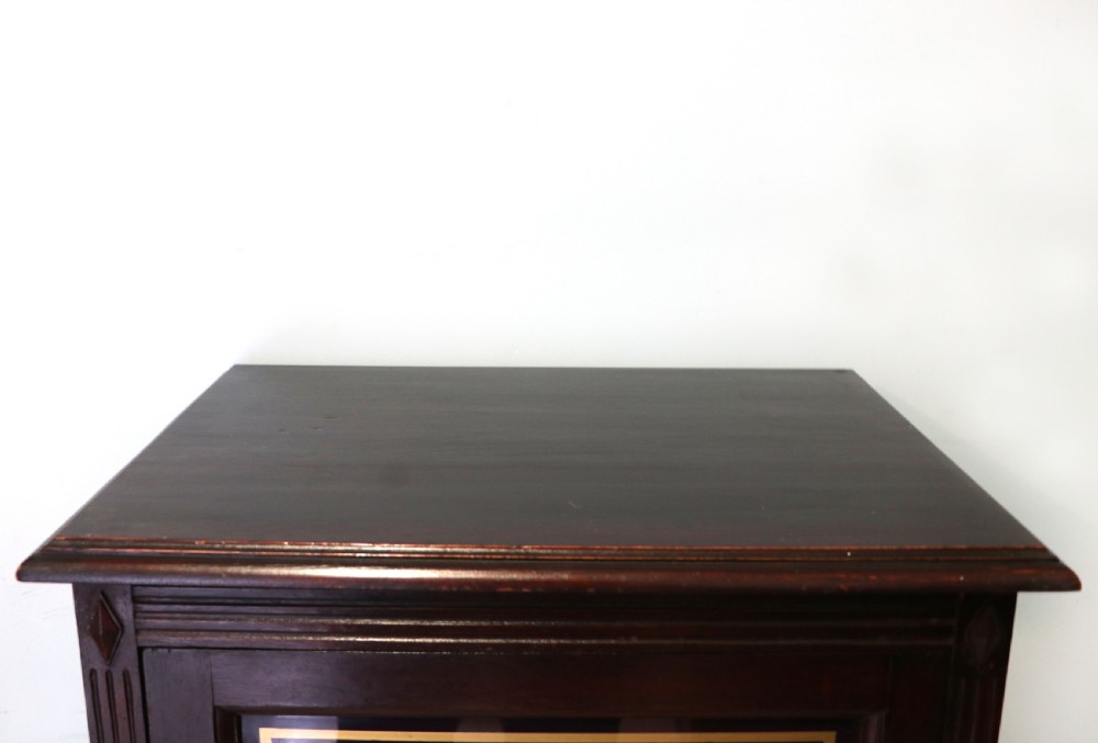 A lovely dark mahogany cabinet hand sign written for Cadburys chocolate. View VIII