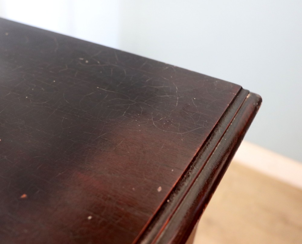 A lovely dark mahogany cabinet hand sign written for Cadburys chocolate. View XII