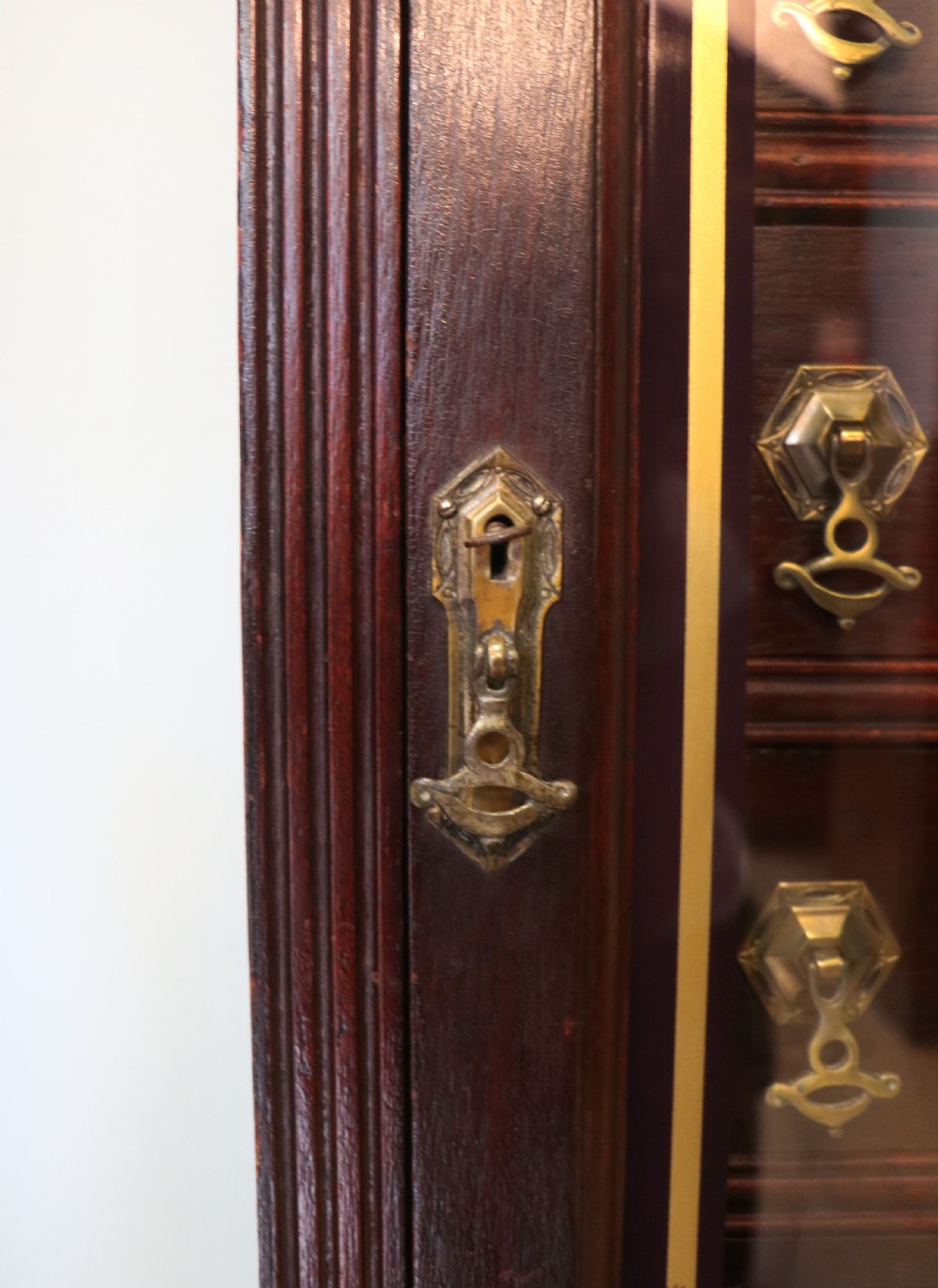 A lovely dark mahogany cabinet hand sign written for Cadburys chocolate. View XV