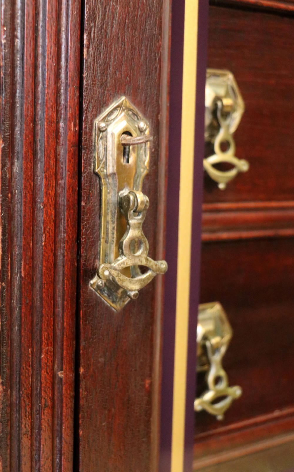 A lovely dark mahogany cabinet hand sign written for Cadburys chocolate. View XVI