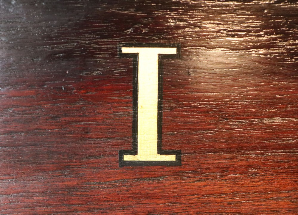 A lovely dark mahogany cabinet hand sign written for Cadburys chocolate. View XX