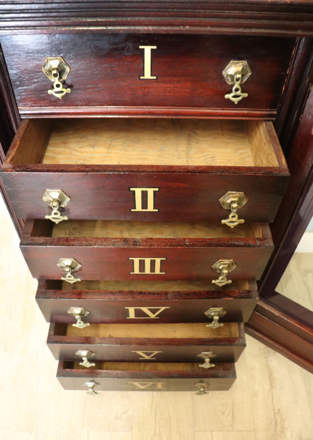 A lovely dark mahogany cabinet hand sign written for Cadburys chocolate. View XXVIII