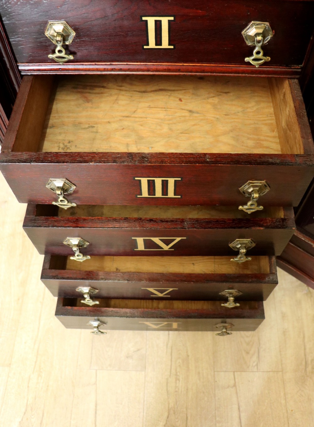 A lovely dark mahogany cabinet hand sign written for Cadburys chocolate. View XXIX
