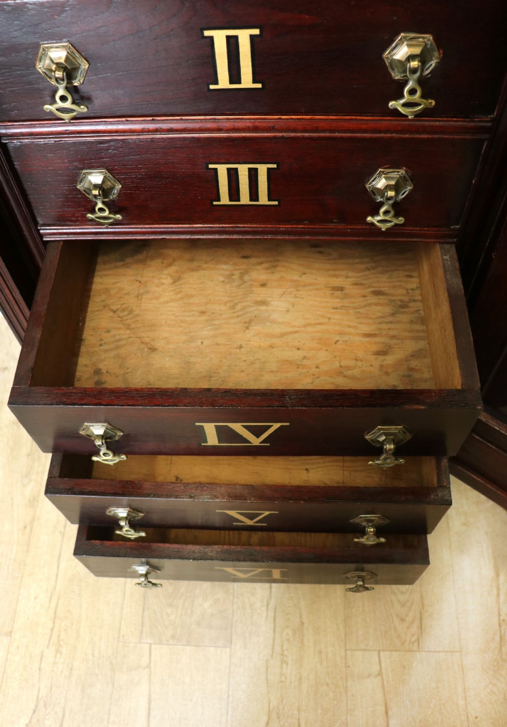 A lovely dark mahogany cabinet hand sign written for Cadburys chocolate. View XXX