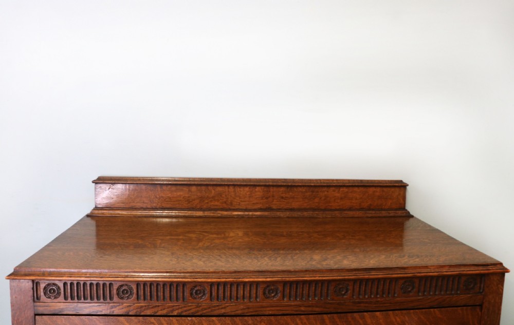 A Edwardian oak combination chest and cupboard. View X