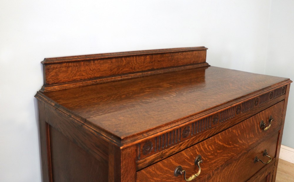 A Edwardian oak combination chest and cupboard. View XIII
