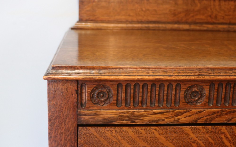 A Edwardian oak combination chest and cupboard. View XIV