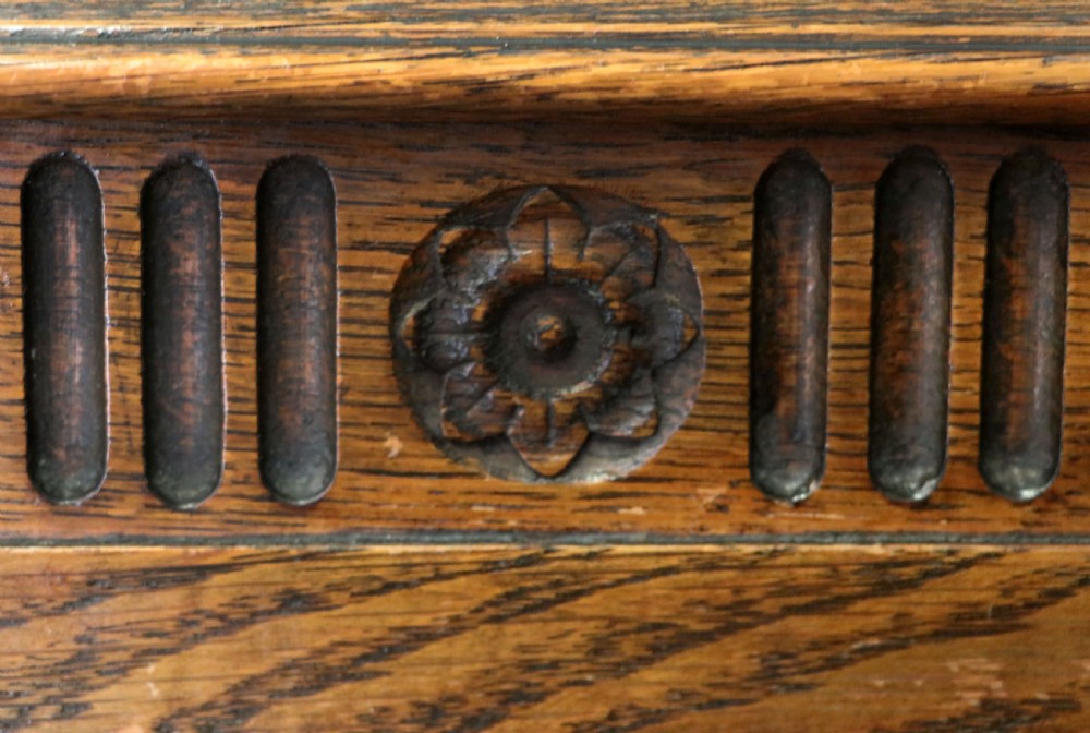 A Edwardian oak combination chest and cupboard. View XVII