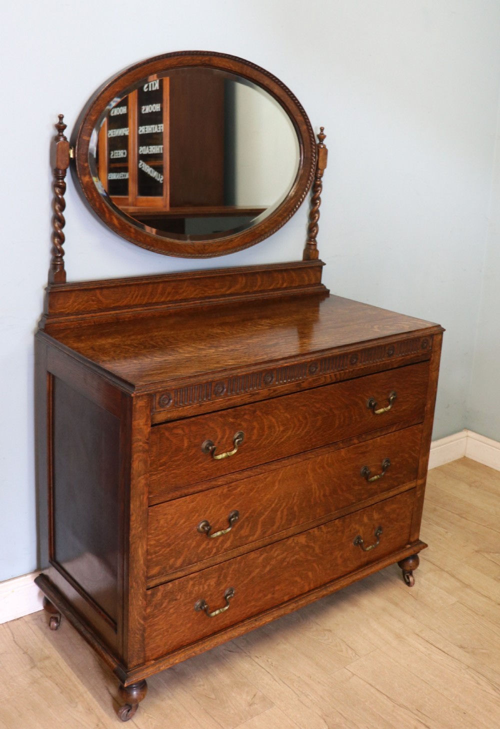 A  Edwardian oak dressing table with an adjustable oval mirror.  View III