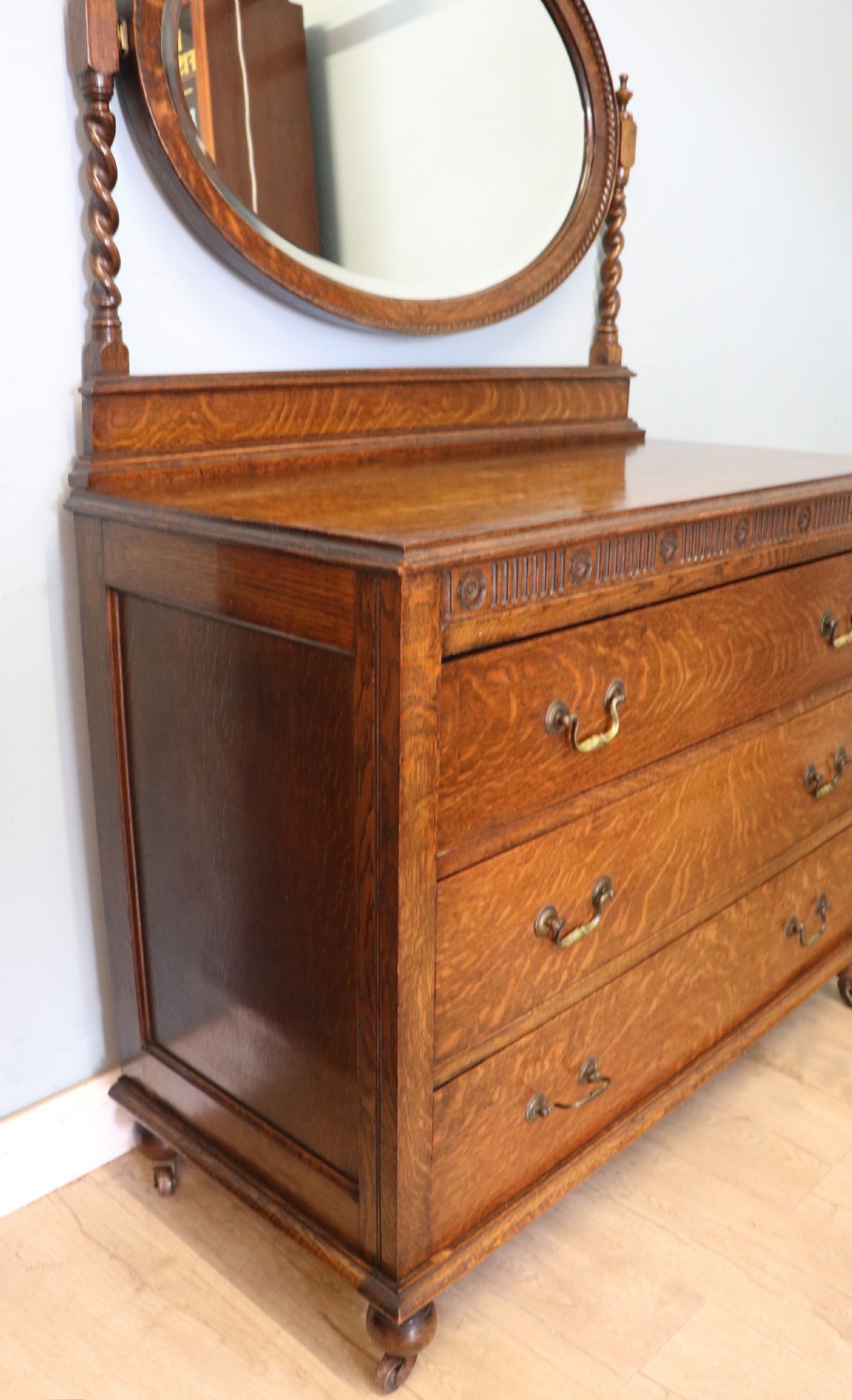 A  Edwardian oak dressing table with an adjustable oval mirror.  View IV