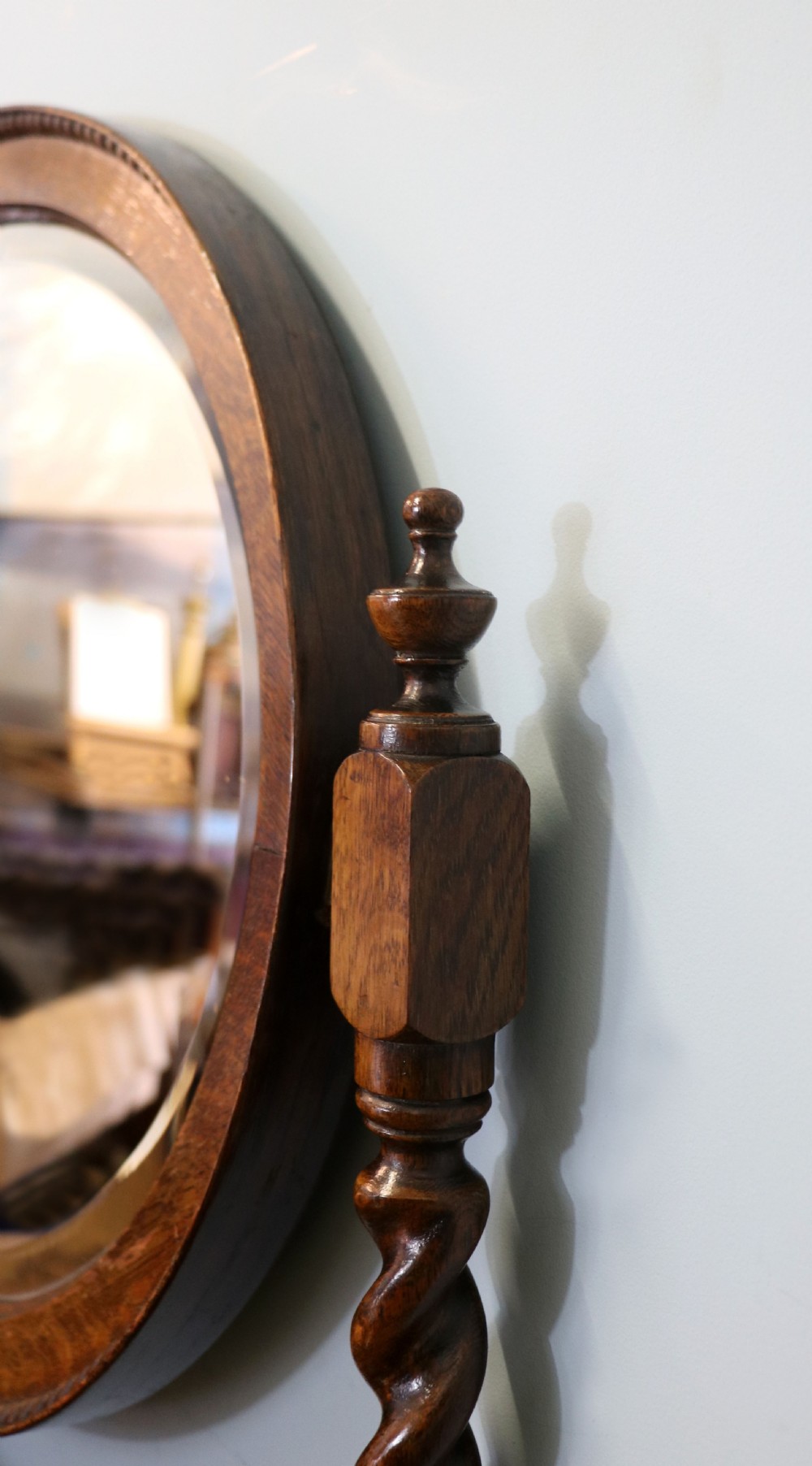 A  Edwardian oak dressing table with an adjustable oval mirror.  View IX