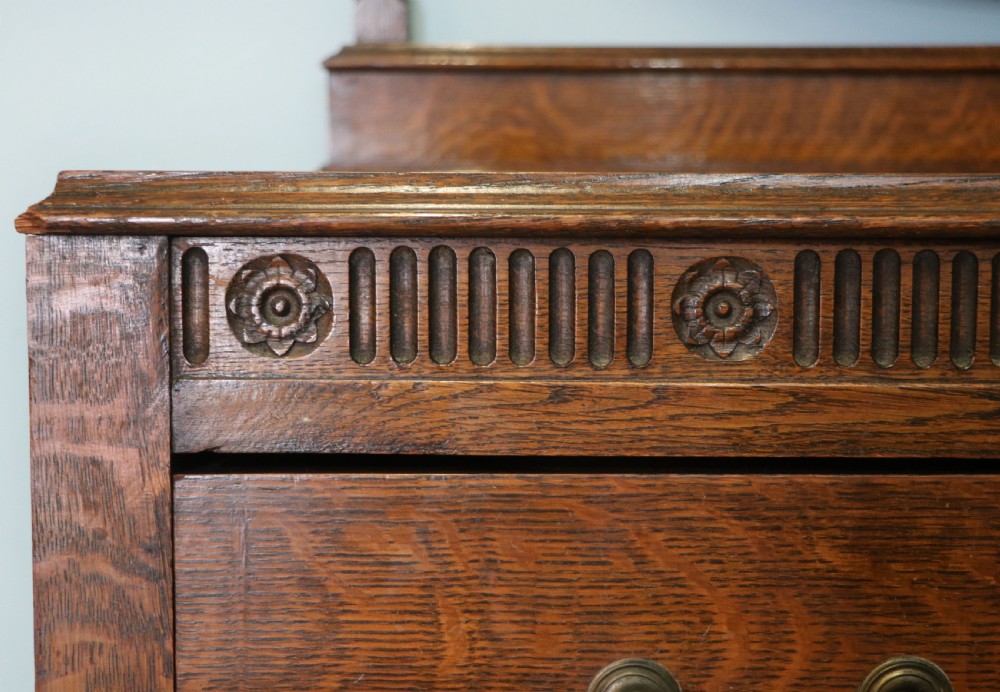 A  Edwardian oak dressing table with an adjustable oval mirror.  View XIII