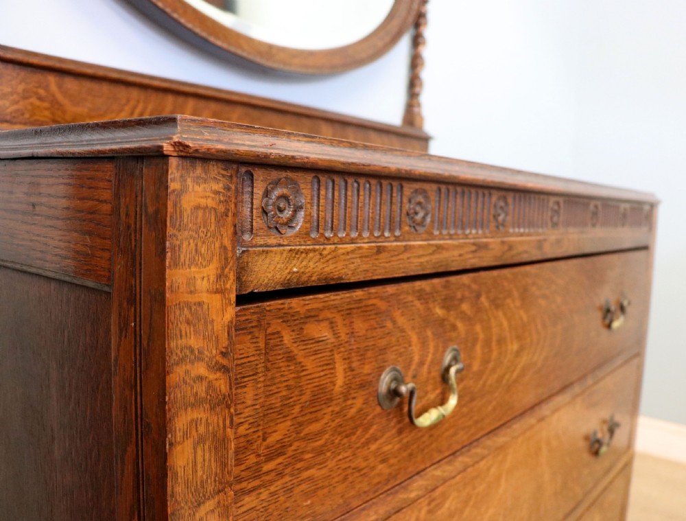 A  Edwardian oak dressing table with an adjustable oval mirror.  View XV
