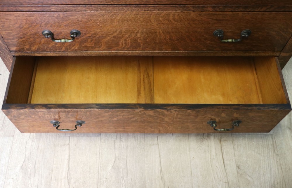 A  Edwardian oak dressing table with an adjustable oval mirror.  View XX