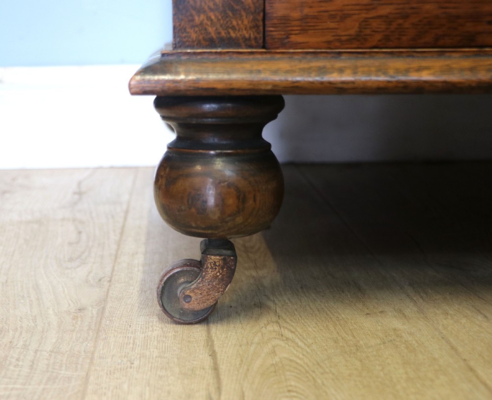 A  Edwardian oak dressing table with an adjustable oval mirror.  View XXII