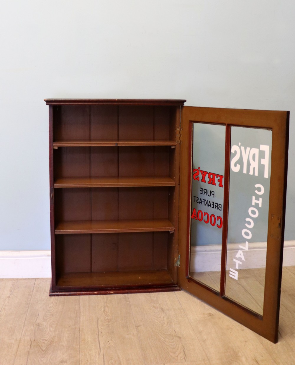 A 19th century mahogany shop display cabinet later sign written for Fry’s cocoa. View VI