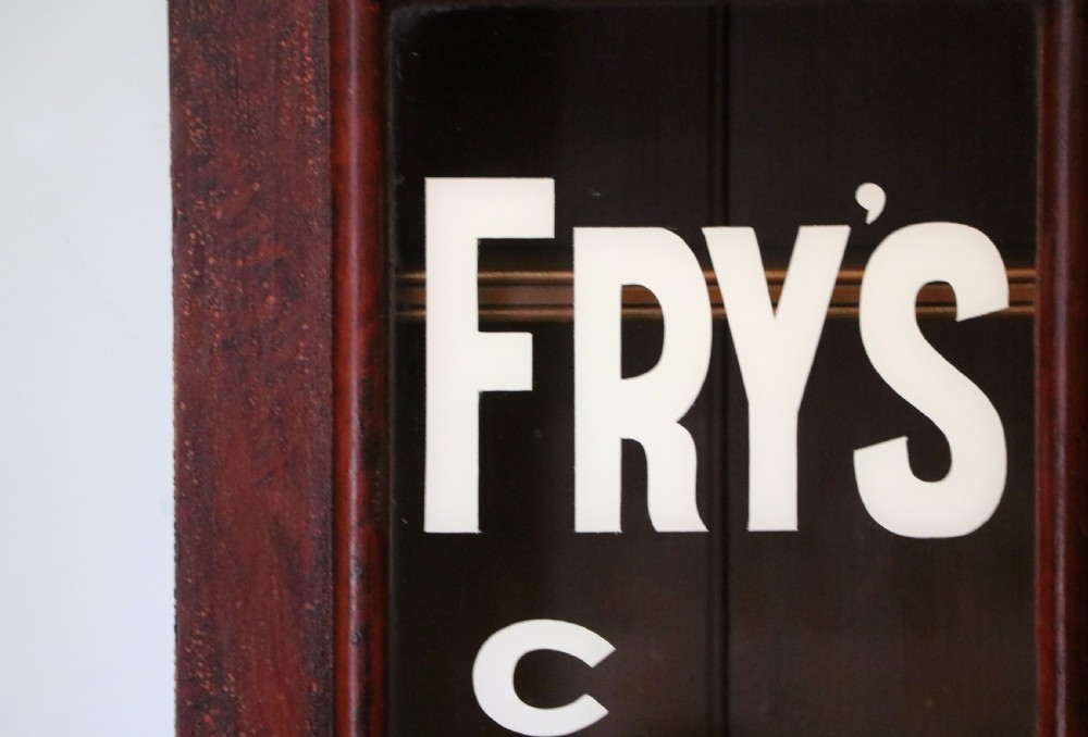 A 19th century mahogany shop display cabinet later sign written for Fry’s cocoa. View VIII