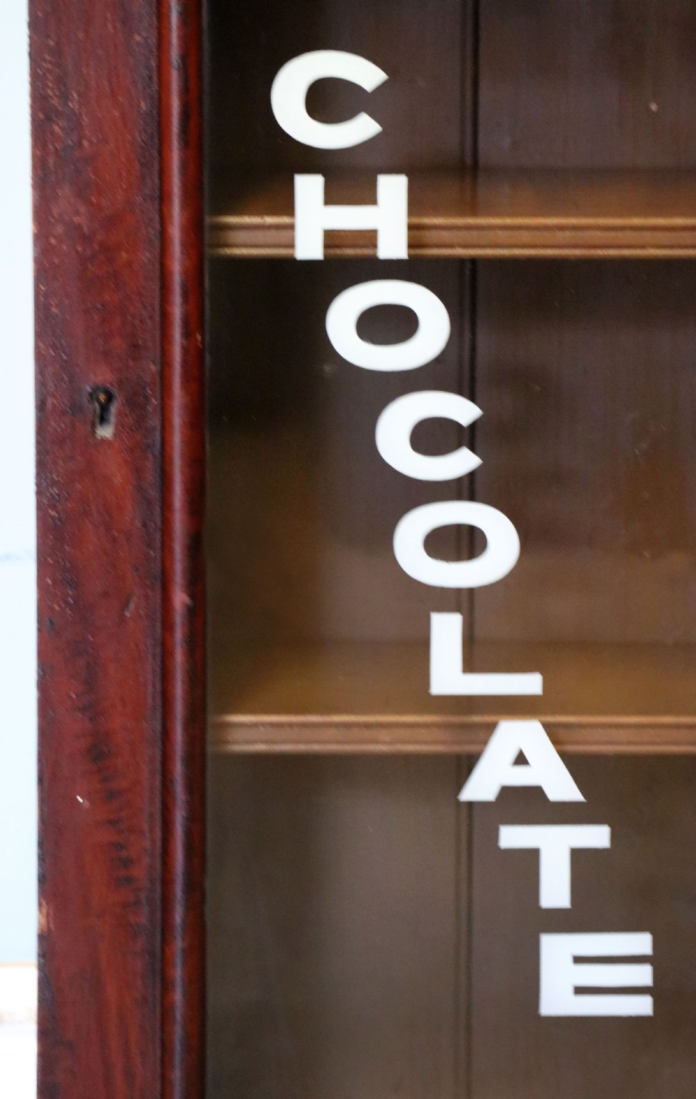 A 19th century mahogany shop display cabinet later sign written for Fry’s cocoa. View IX