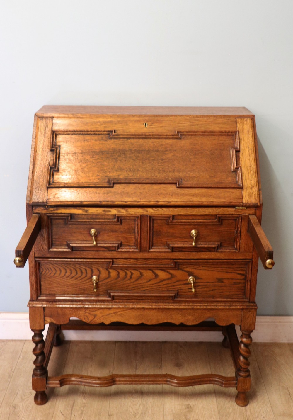 An absolutely charming Jacobean revival oak bureau. View III