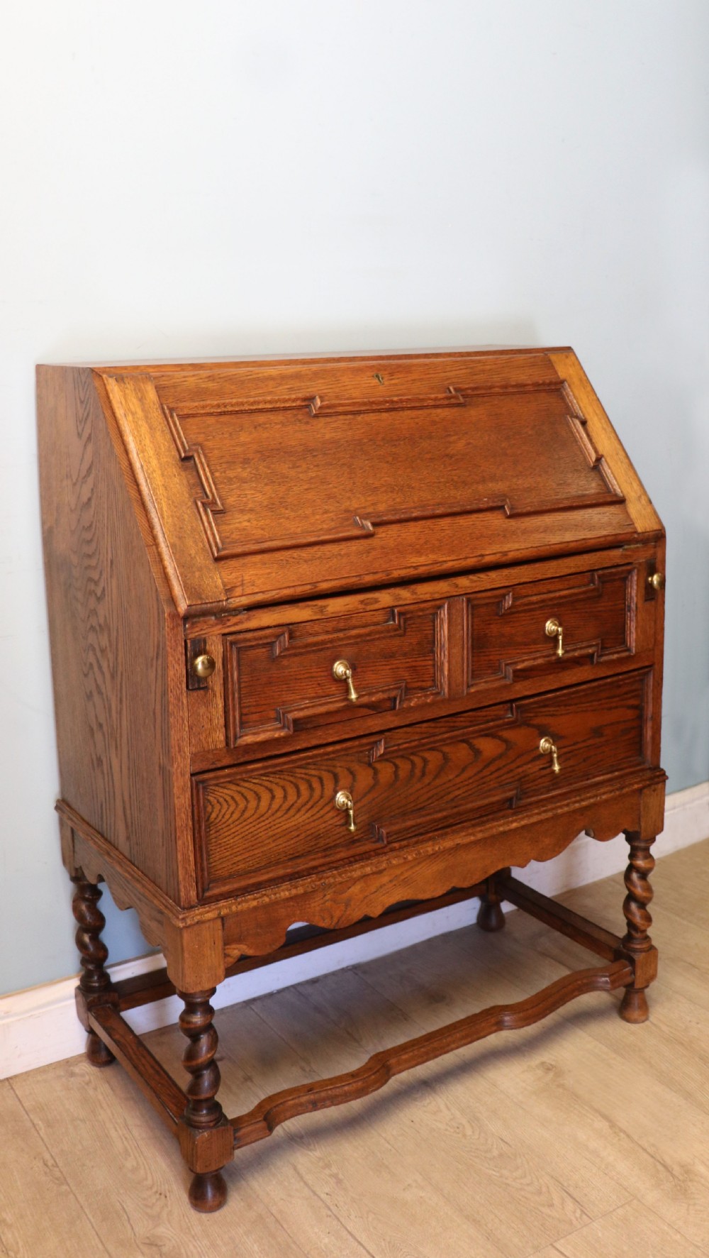 An absolutely charming Jacobean revival oak bureau. View IV