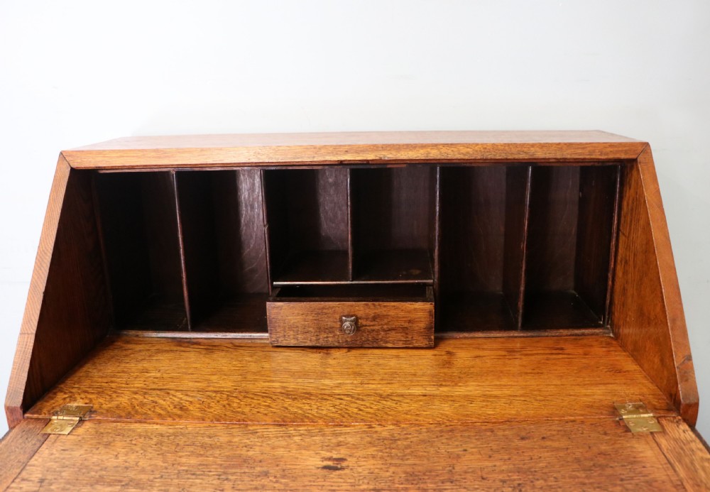 An absolutely charming Jacobean revival oak bureau. View XI